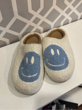 Cozy Cream Slippers with Blue Smiley Faces